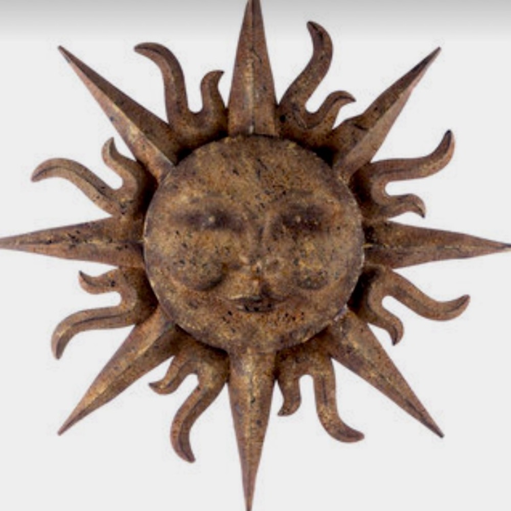 Sun with face metal wall decor